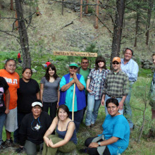 group standing in forest on White Mountain Apache Tribe land
