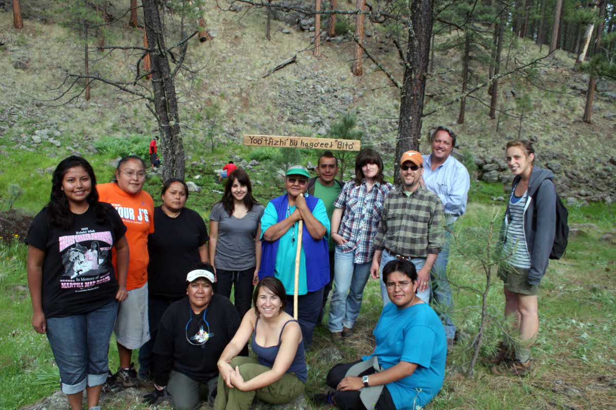 group standing in forest on White Mountain Apache Tribe land
